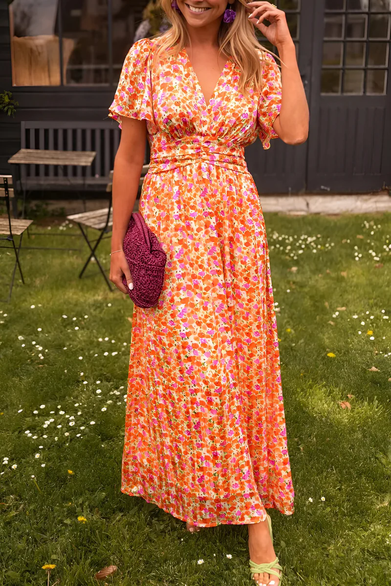 Robe longue fleurie à taille marquée et coupe fluide pour l'été