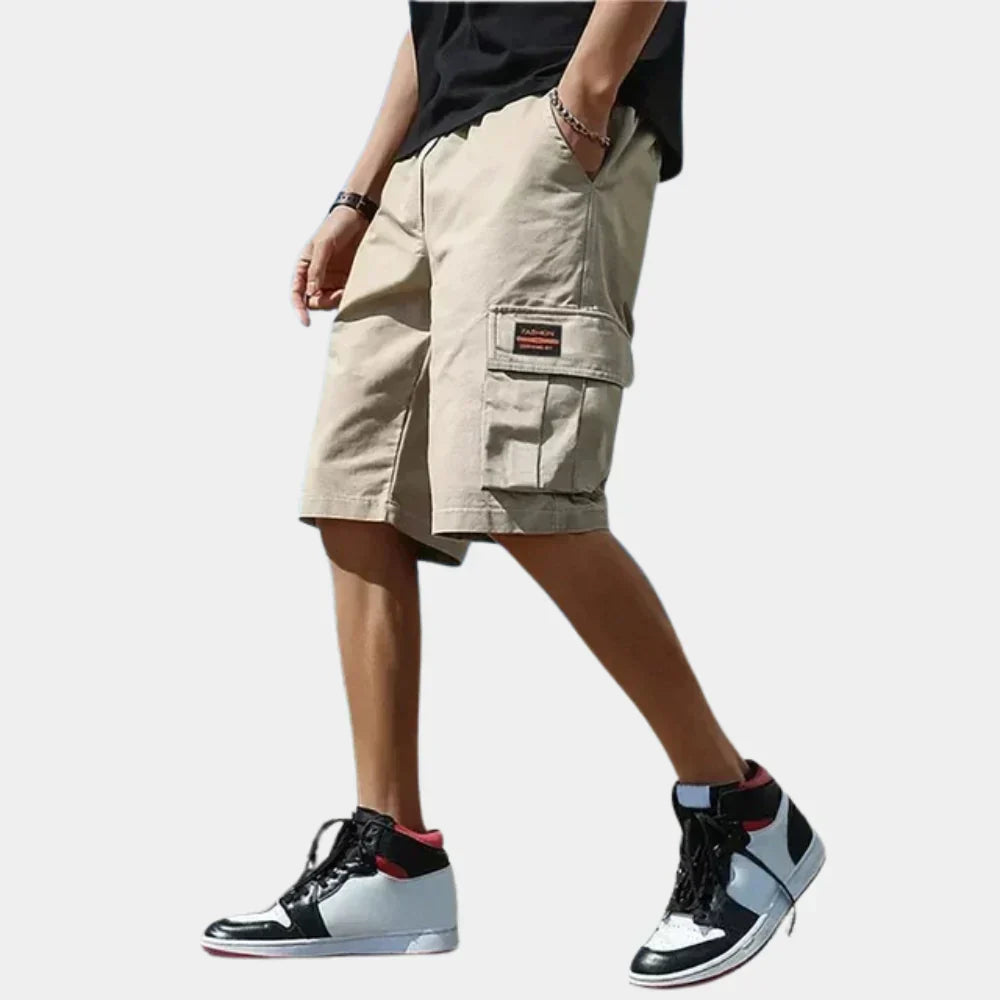 Short cargo homme coupe large longueur genou à poches à rabat