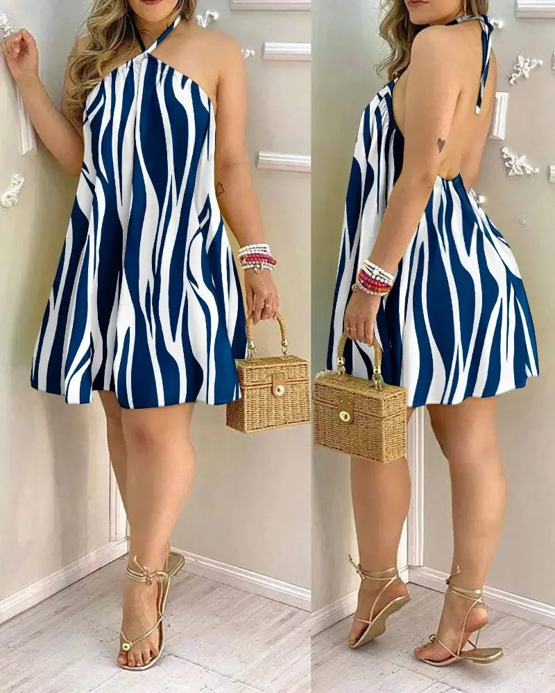 Coralie – Robe d'été courte dos nu à imprimé tropical
