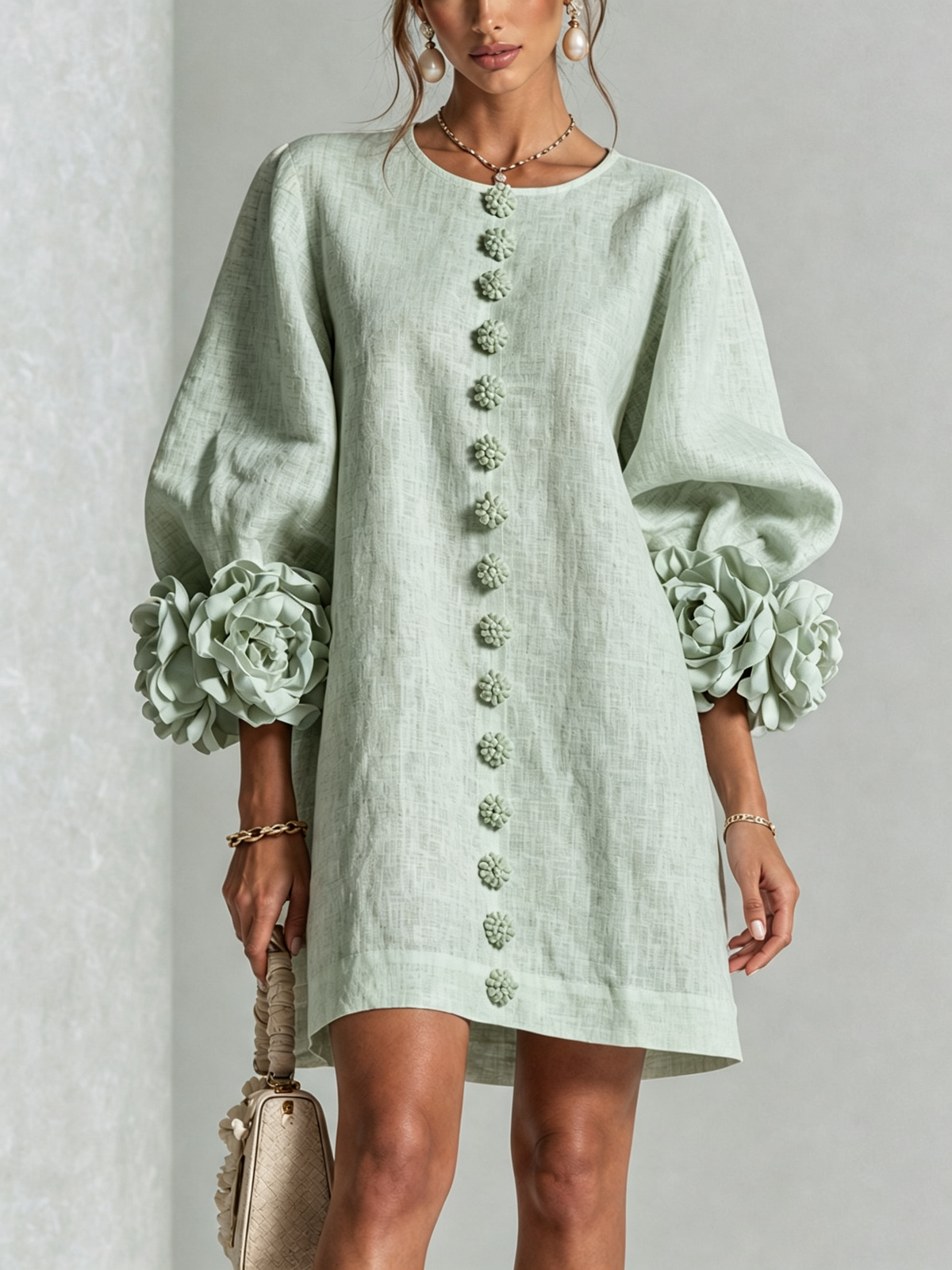 Robe élégante trapèze courte boutonnée à manches bouffantes