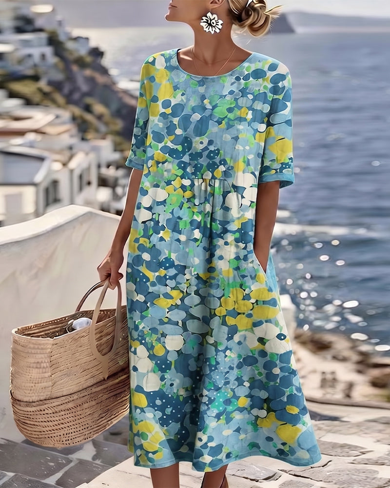 Robe midi fleurie en coton et lin à manches courtes et poches