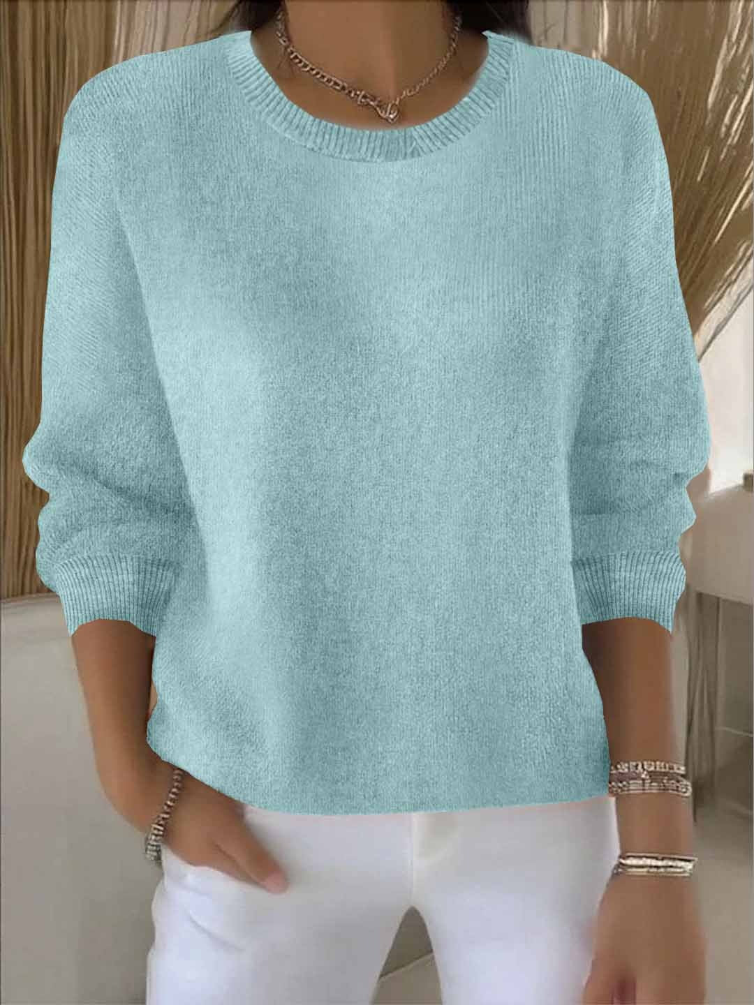 Pull femme en maille côtelée à col rond et manches longues 10