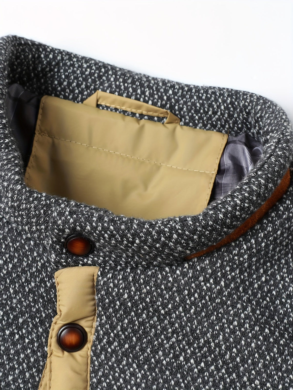Doudoune homme matelassée courte à empiècements tricot et passepoils contrastants