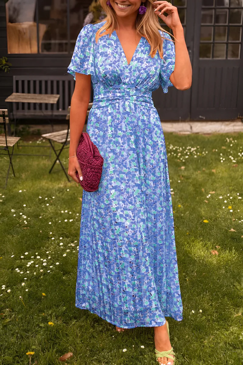 Robe longue fleurie à taille marquée et coupe fluide pour l'été