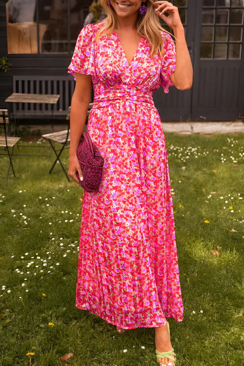 Robe longue fleurie à taille marquée et coupe fluide pour l'été