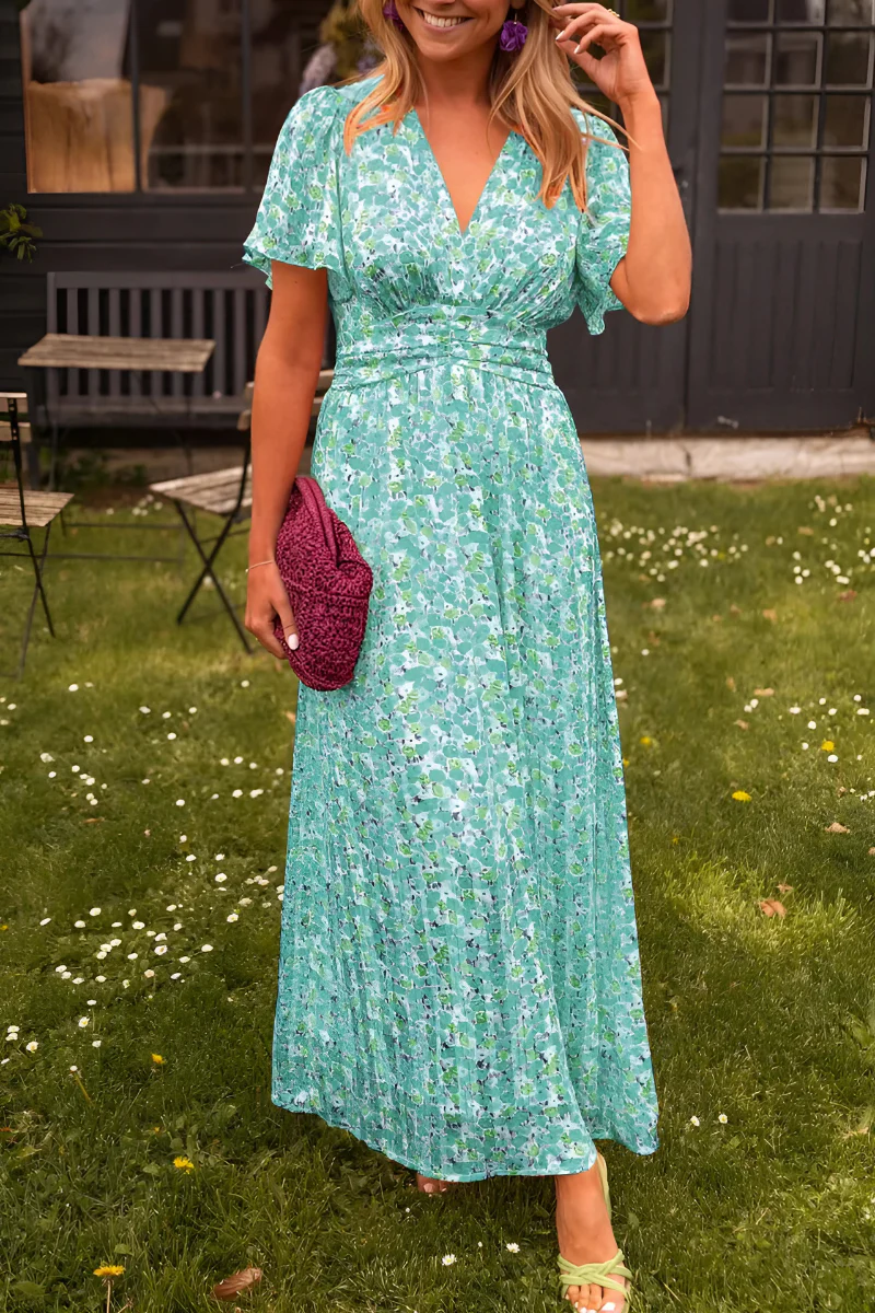 Robe longue fleurie à taille marquée et coupe fluide pour l'été