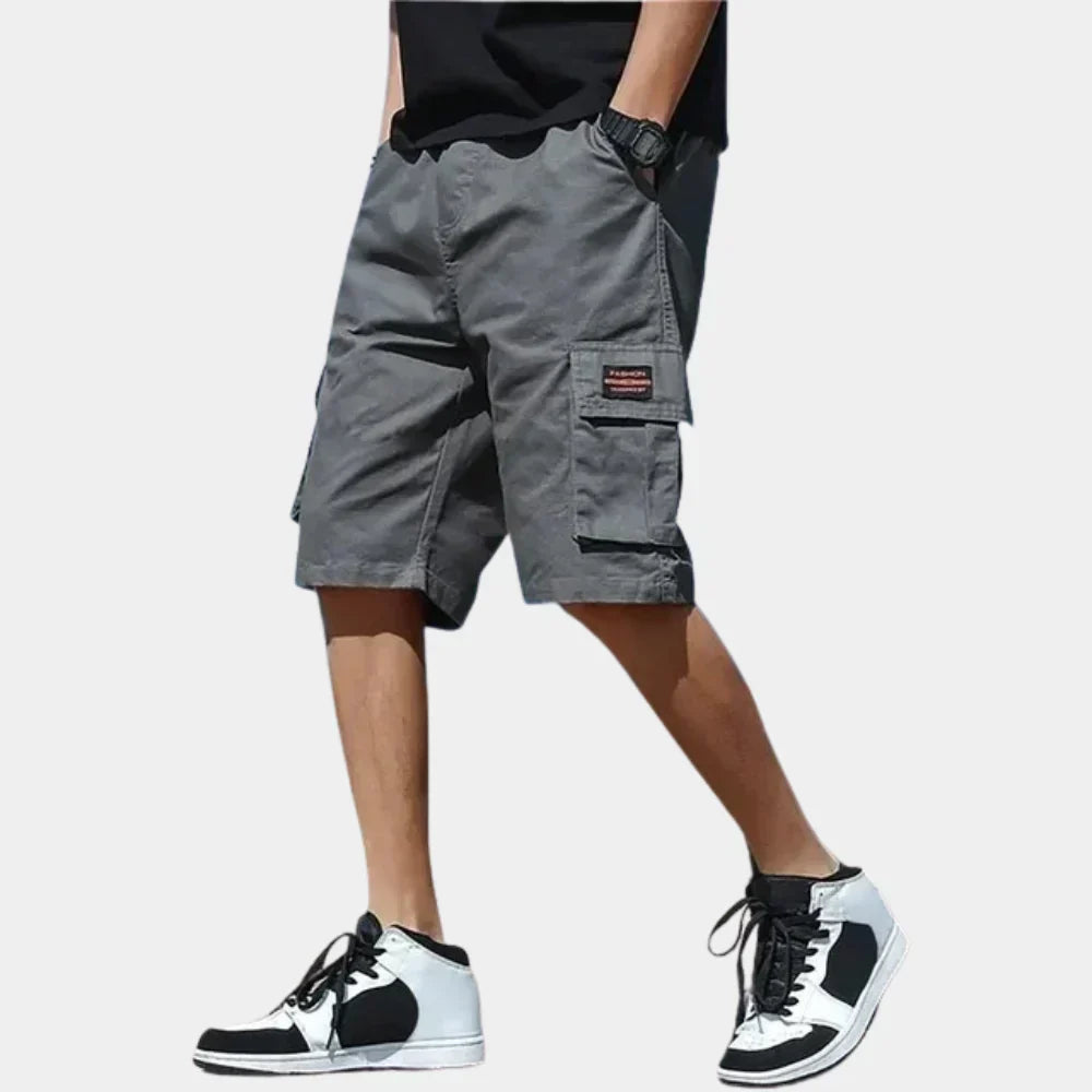 Short cargo homme coupe large longueur genou à poches à rabat
