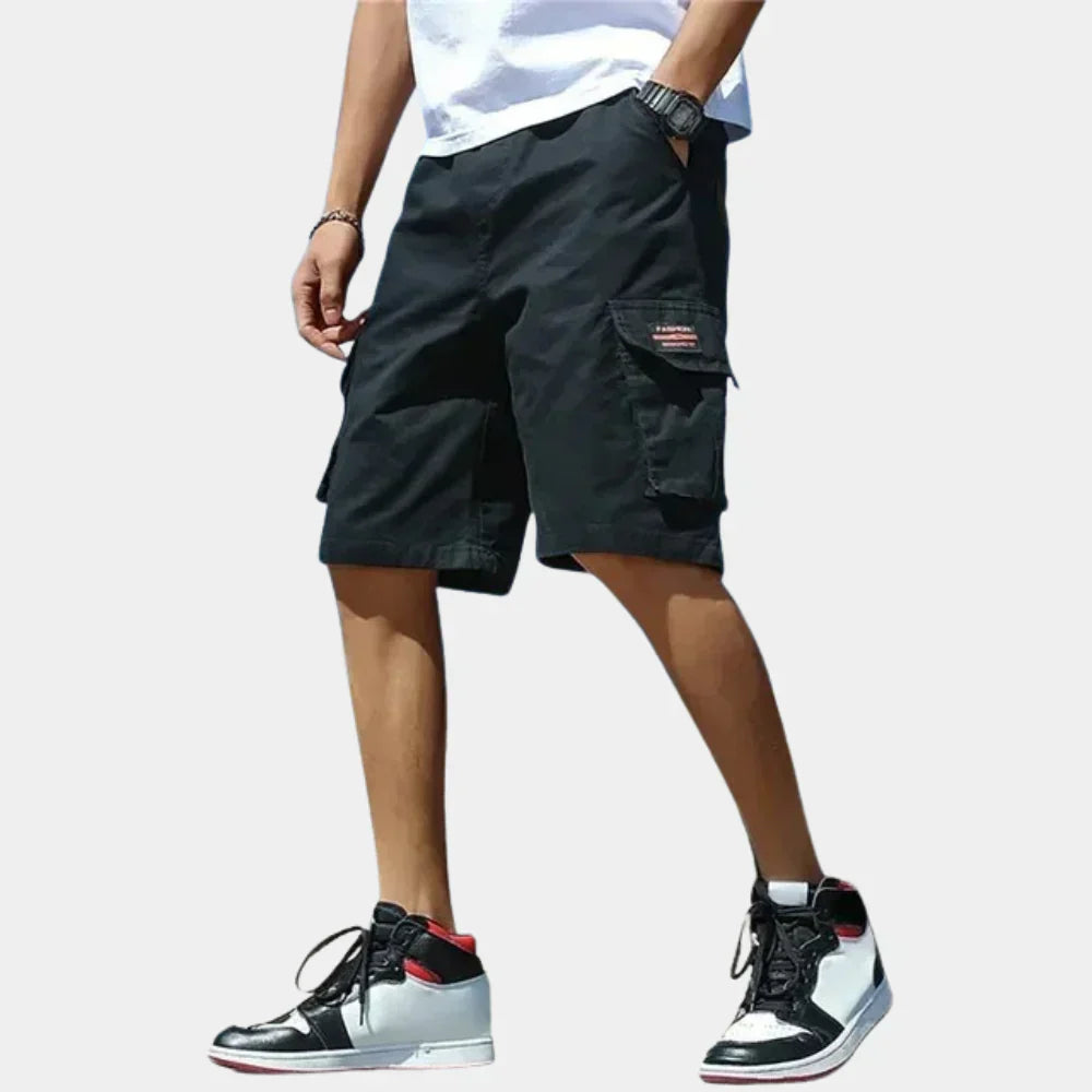 Short cargo homme coupe large longueur genou à poches à rabat
