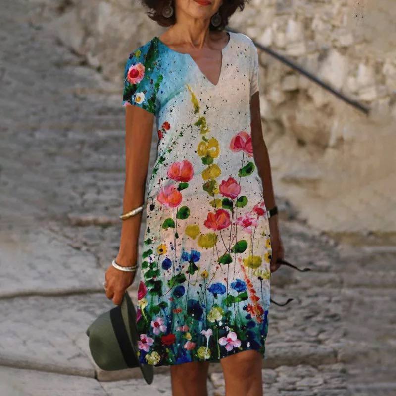 Héloïse – Robe mini d’été à motif floral manches courtes femme
