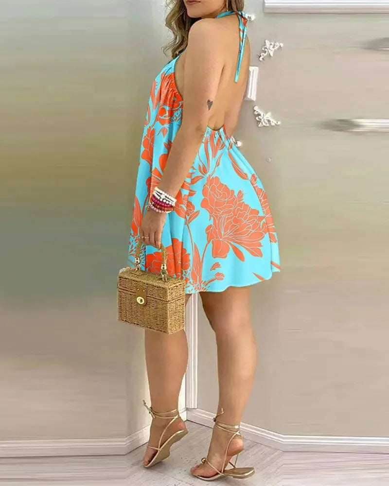 Coralie – Robe d'été courte dos nu à imprimé tropical