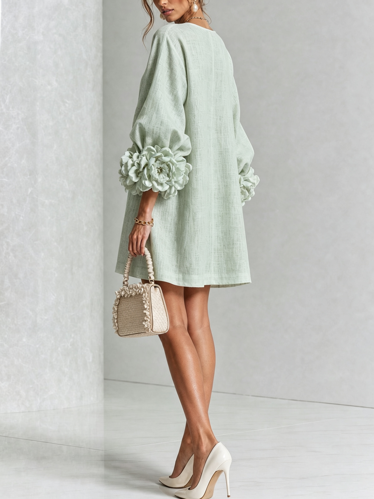Robe élégante trapèze courte boutonnée à manches bouffantes