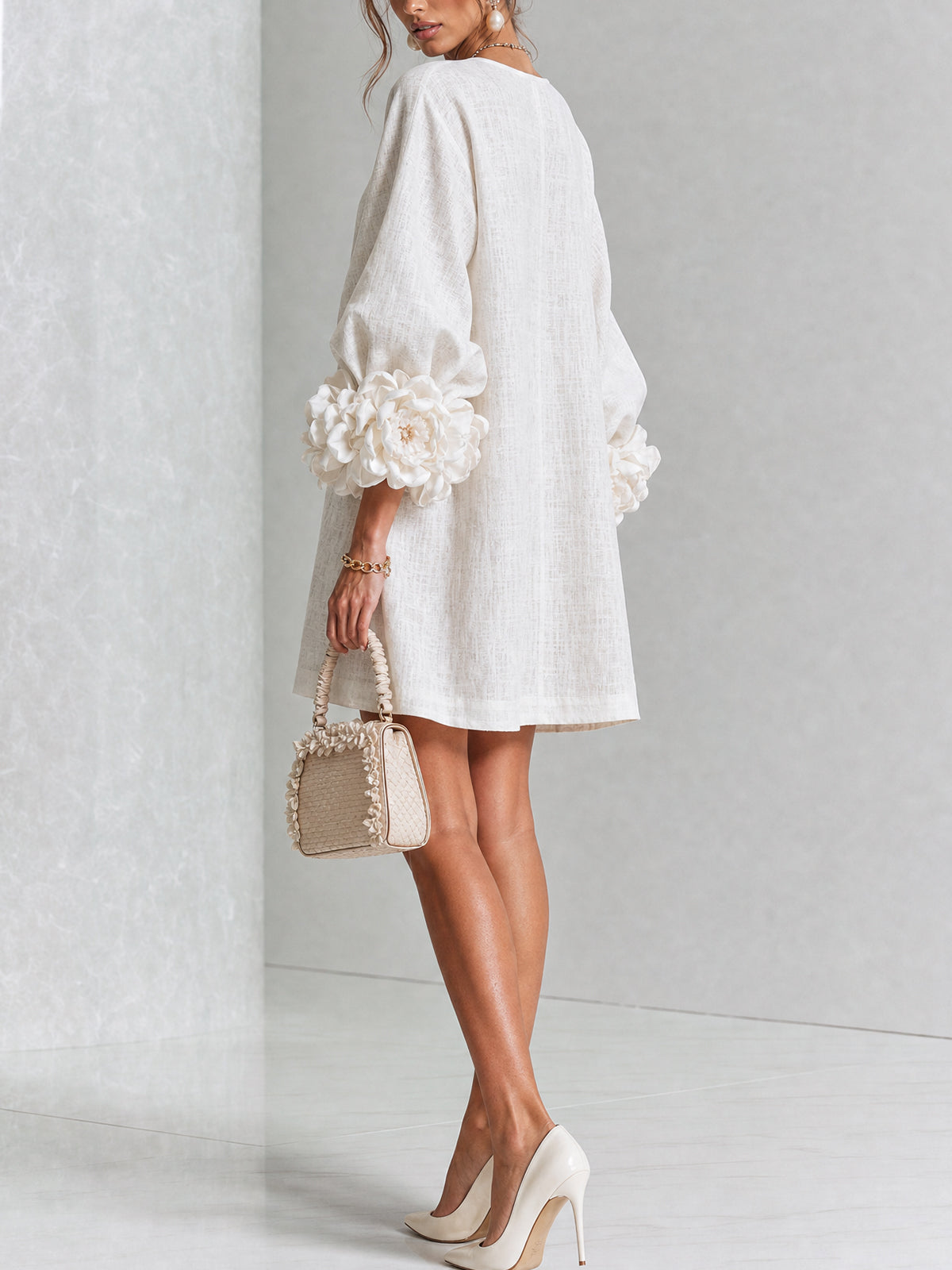 Robe élégante trapèze courte boutonnée à manches bouffantes