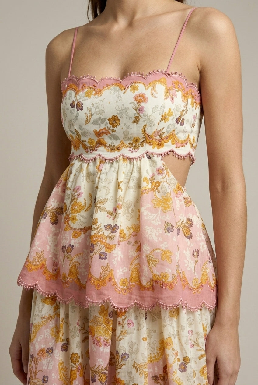 Domitille – Robe maxi sans manches à imprimé floral, bordure festonnée et jupe à étages femme