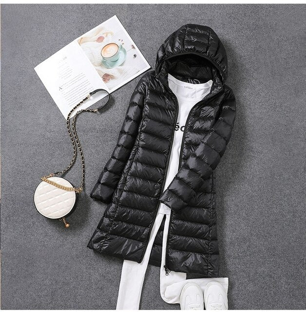 Doudoune longue femme à capuche amovible zippée 1