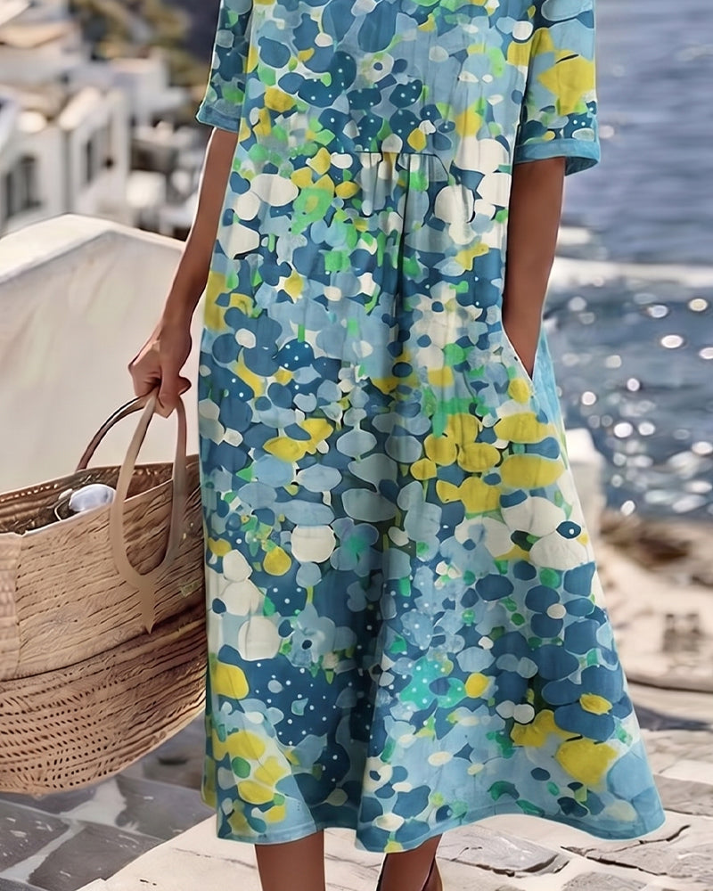 Robe midi fleurie en coton et lin à manches courtes et poches