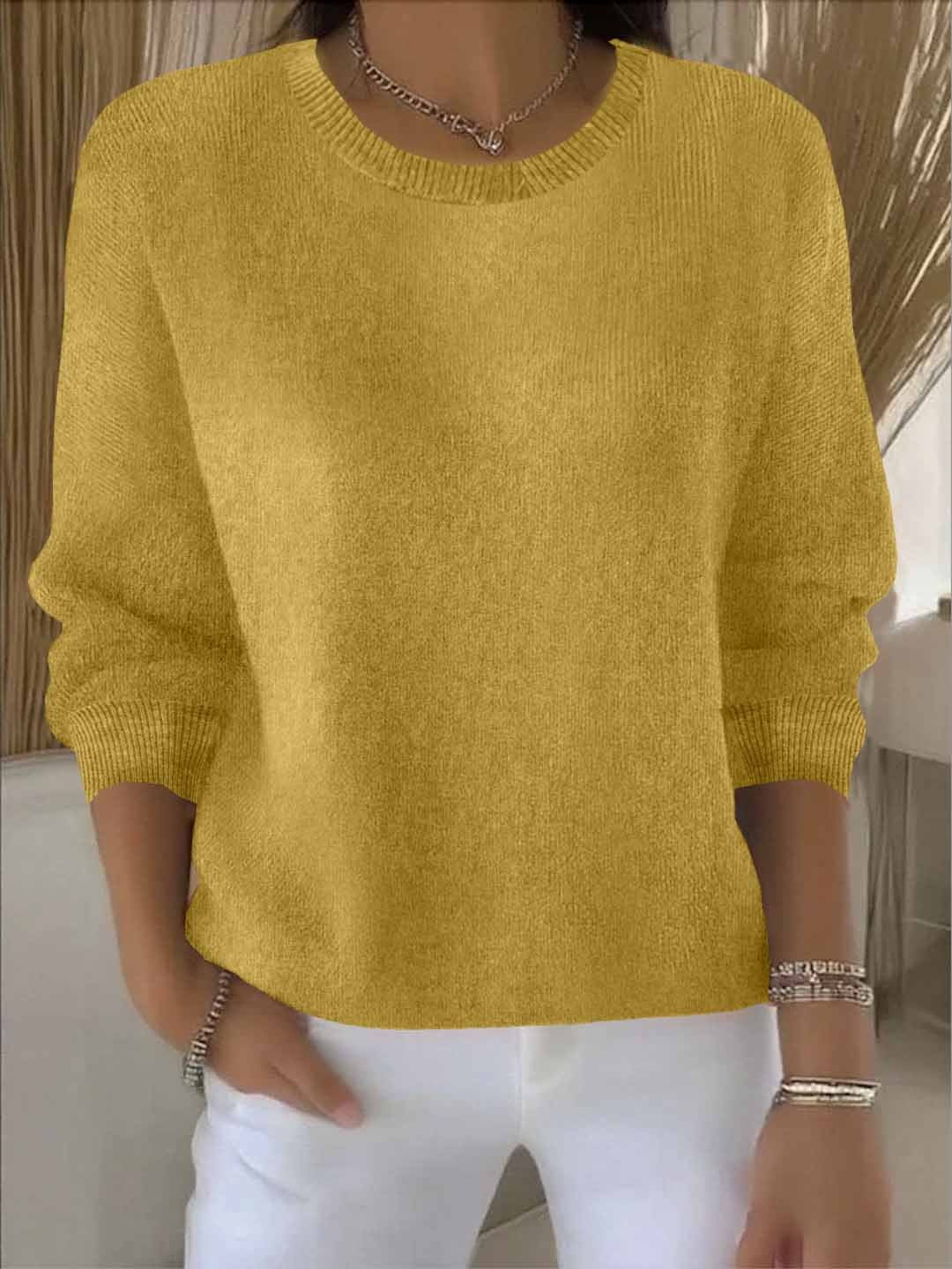 Pull femme en maille côtelée à col rond et manches longues 1
