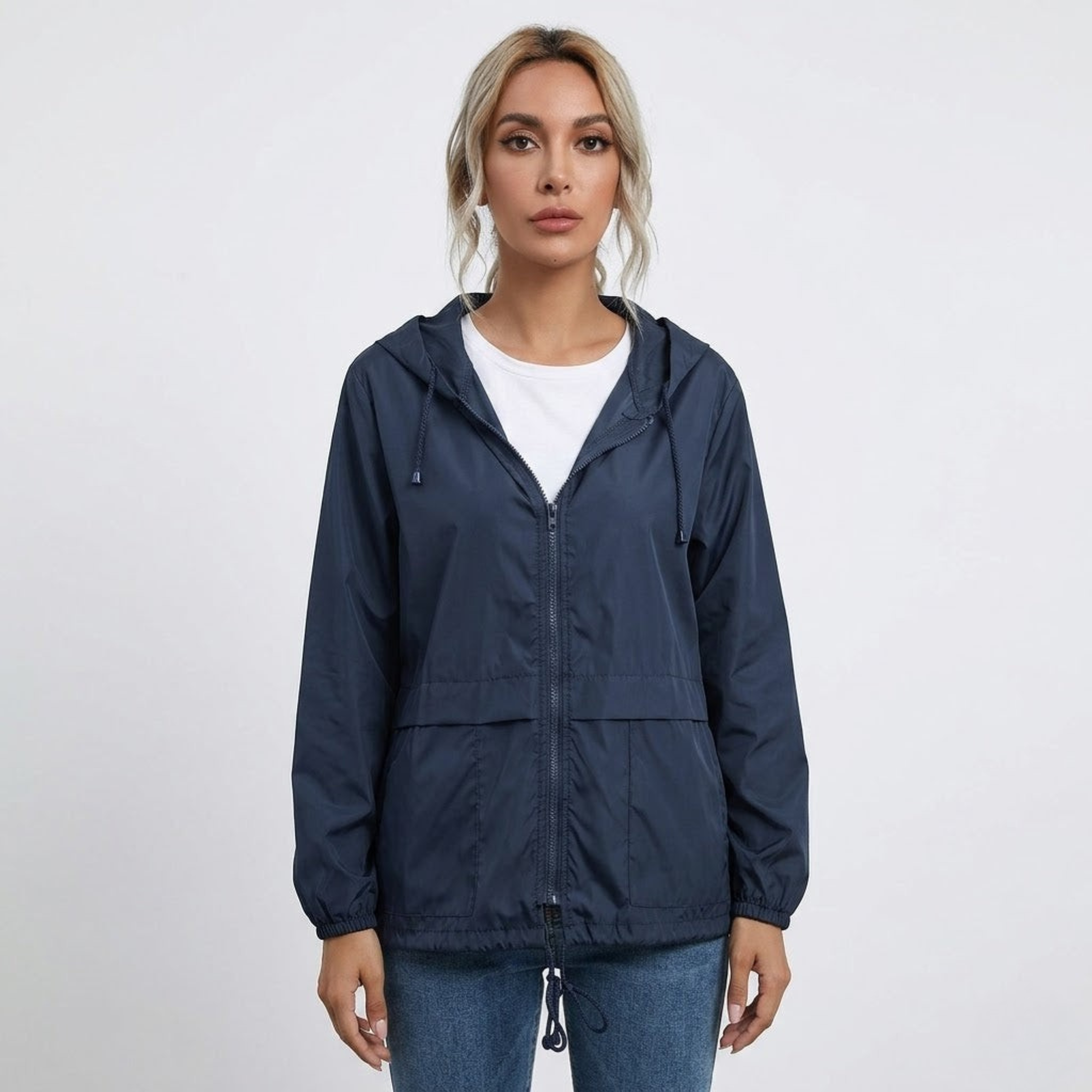 Veste de pluie femme légère et déperlante à capuche avec fermeture éclair 1