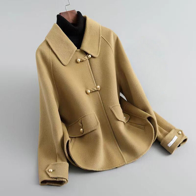 Veste mi-saison femme en maille à boutons perle et col marqué 1