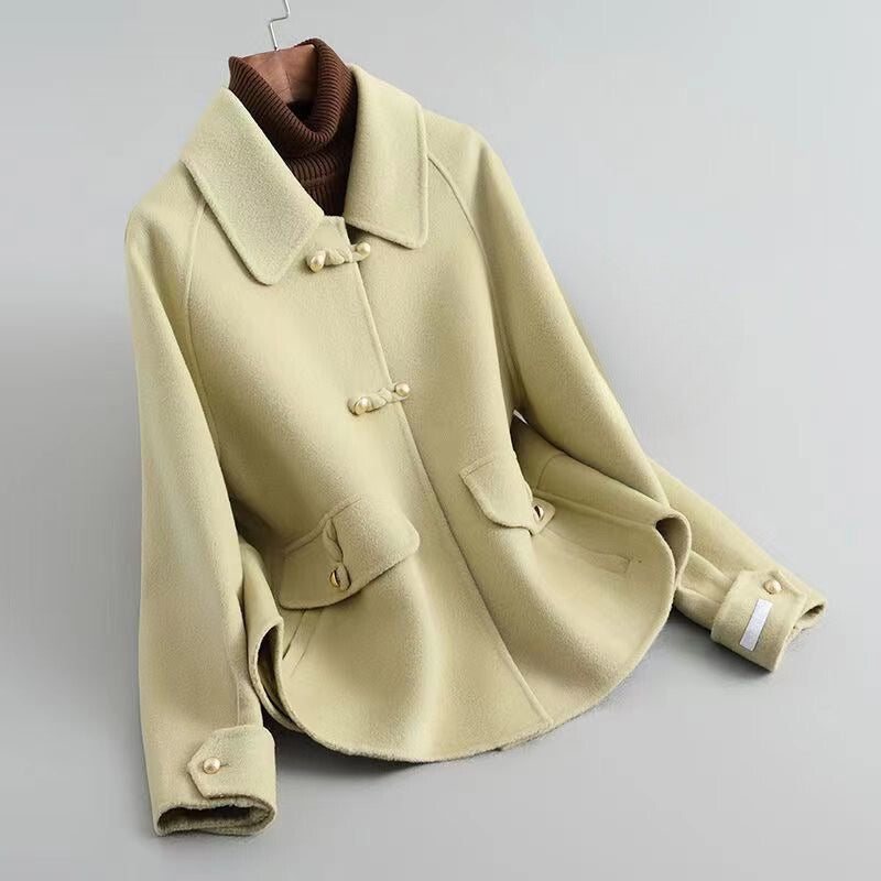 Veste mi-saison femme en maille à boutons perle et col marqué 2